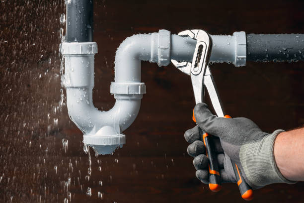 Professional Plumber technician working in Lake, MS